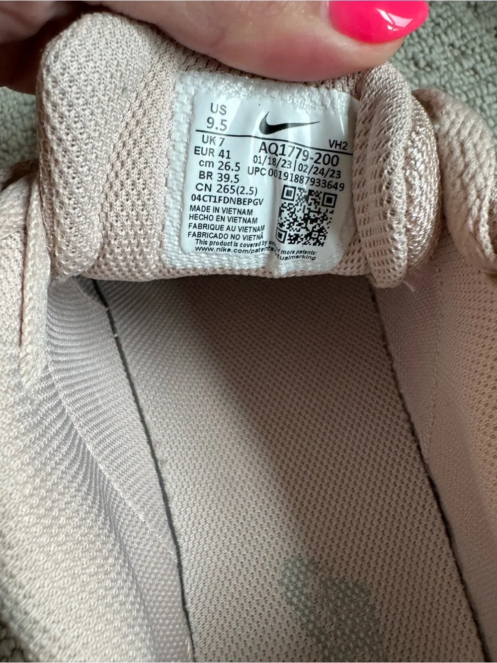 Nike Women’s Blush Pink Low-Top Sneakers with White Swoosh